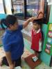 ทำการประเมินเด็กตามคู่มือDSPM เเละชั่งน้ำหนัก/ส่วนสูง ภาคเรี
